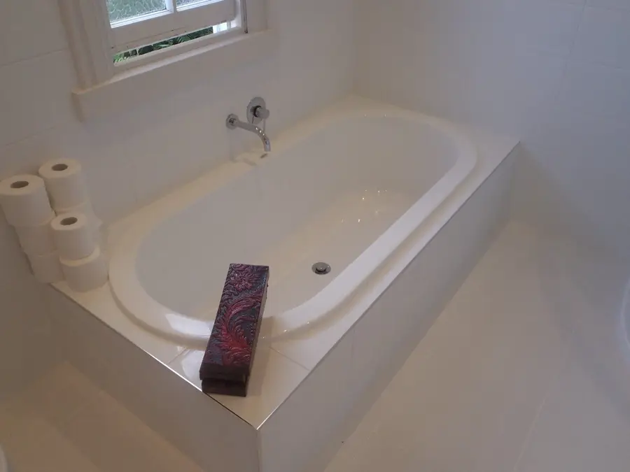 Bathroom renovation — new bath & tiling